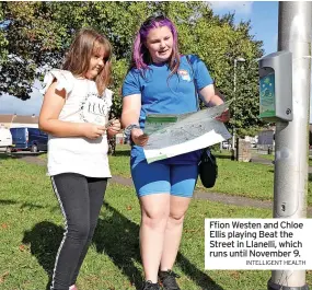  ?? INTELLIGEN­T HEALTH ?? Ffion Westen and Chloe Ellis playing Beat the Street in Llanelli, which runs until November 9.