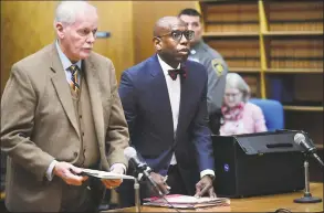  ?? Erik Trautmann / Hearst Connecticu­t Media ?? Darnell Crosland, right, of Norwalk, charged with bribery, witness tampering and conspiracy to commit witness tampering, appears with attorney Wayne Keeney for a pretrial hearing Wednesday at state Superior Court in New Haven.