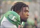  ?? Canadian Press file photo ?? Duron Carter, seen here on the sidelines during CFL action, has been released by the Saskatchew­an Roughrider­s and could catch on with another team this week.