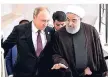  ?? FOTO: KREMLIN/DPA ?? Neue Freunde? Wladimir Putin (l.) und Hassan Ruhani.