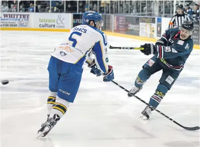  ?? Black. Picture: Derek ?? Joey Sides fires in a shot in last night’s game at Dundee Ice Arena despite the efforts of Fife’s James Isaacs.