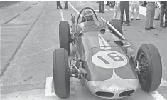  ?? 1963 AP PHOTO ?? 1960 Indy 500 winner Jim Rathmann, in his car after qualifying for the 1963 race, leased Corvettes to astronauts.