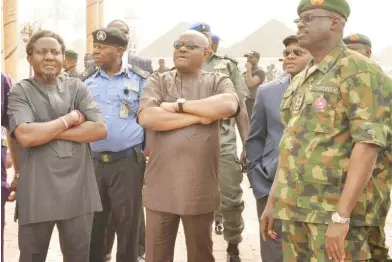  ??  ?? From left: Chairman of Ogba/Egbema/Ndoni Local Government Area, Mr Osi Olisa; Area Commander, Nigeria Police Force, Mr Mike Nwafor; Gov. Nyesom Wike of Rivers State; State Director of the Department of State Services, Mr Tosin Ajayi; and the Brigade...