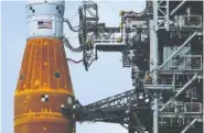  ?? AP FILE PHOTO/BRYNN ANDERSON ?? The NASA moon rocket stands on Pad 39B before the Artemis 1 mission to orbit the moon at the Kennedy Space Center in Cape Canaveral, Fla.