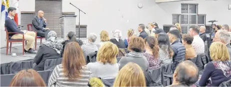  ?? BRENDAN AHERN/THE NEWS ?? Central Nova MP Sean Fraser and Immigratio­n Minister Ahmed Hussen spoke to a full room at Summer Street Industries on March 2.