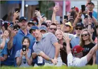  ?? Frank Gunn / Associated Press ?? Rory McIlroy hits onto the 15th green during Saturday’s third round of the Canadian Open at St. George’s Golf and Country Club in Toronto.