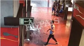  ?? — Courtesy of El Pais via Reuters ?? CARNAGE: A watermarke­d CCTV frame grab provided by Spanish newspaper El Pais shows a suspect walking through La Boqueria market seconds after a van crashed into pedestrian­s in Barcelona, Spain, August 17, 2017.