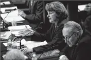  ??  ?? Sen. Dianne Feinstein, D-Calif., speaks at a Senate Judiciary Committee meeting Thursday. The panel approved a measure that would make the practice of illegally buying a gun for someone else a felony.