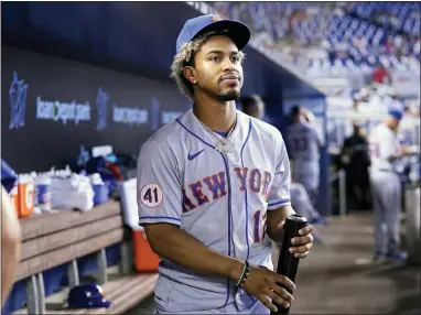  ?? LYNNE SLADKY - THE ASSOCIATED PRESS ?? FILE - In this Thursday, Aug. 5, 2021, file photo, New York Mets’ Francisco Lindor looks from the dugout before a baseball game against the Miami Marlins, in Miami.