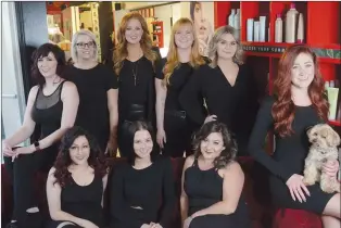  ?? NEWS PHOTO MO CRANKER ?? Red Velvet Hair and Body Bar Staff pose for a photo Monday at the salon. The group was recently named the Outstandin­g Salon of the Year by the Alberta Hair and Beauty Awards.