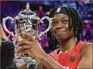 ?? GETTY IMAGES ?? Erica Wheeler of Team Wilson reacts after receiving the MVP trophy at the WNBA All-Star Game 2019 at the Mandalay Bay Events Center on Saturday in Las Vegas. Team Wilson defeated Team Delle Donne 129-126.