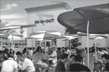  ?? Kent Nishimura Los Angeles Times ?? A STATEMENT from In-N-Out said the company has “made equal contributi­ons to both Democratic and Republican” groups in 2018.