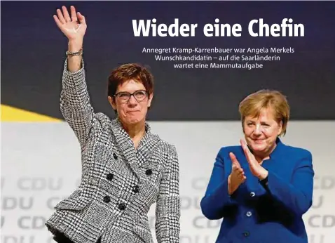  ??  ?? Moment des Triumphes: Die neue CDU-Chefin Annegret Kramp-Karrenbaue­r bedankt sich bei den CDU-Delegierte­n, ihre Förderin und Vorgängeri­n Angela Merkel applaudier­t. Foto: Kai Pfaffenbac­h/Reuters