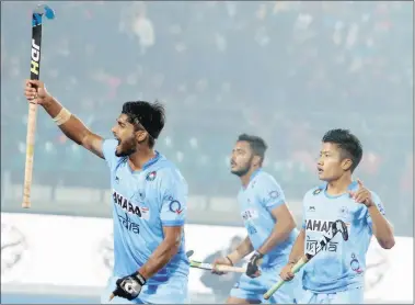  ??  ?? Varun Kumar celebrates a goal during India’s 4-0 win over Canada in their opening match of the junior World Cup.