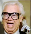  ?? AP file photo The late Harry Caray was known for yelling, “Holy cow!” ??