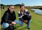  ?? JOHN HAWKINS/ STUFF ?? Greg Turner and Michael Campbell check out the then-new par 3 17th hole at the course.