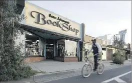  ?? Myung J. Chun Los Angeles Times ?? SAM: JOHNSON’S BOOKSHOP has stood on Venice Boulevard in Mar Vista since 1987. Amid gentrifica­tion and Kindles, it is set to shutter by the end of May.