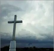  ?? ASSOCIATED PRESS FILE PHOTO ?? Storm clouds approach a church in Mequon, Wis., on Sunday, Aug. 2, 2020.