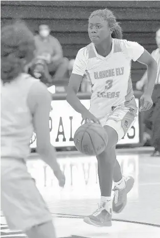  ?? MICHAEL LAUGHLIN | SUN SENTINEL PHOTOS ?? Blanche Ely’s Ja’Leah Williams brings the ball up the court against Western during the first half of their Big 8 semifinal Friday at South Plantation High.