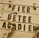  ??  ?? Clockwise from above: Fier d’être Acadien (“Proud to be Acadian”) emblazoned on a crate; lobster meat; the silent auction; evening on the Tusket River, near town; local musicians Sébastien Dol and André Muise.