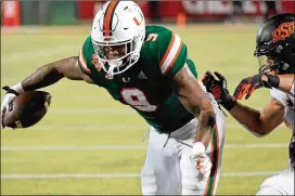  ?? JOHN RAOUX/AP 2020 ?? “Any offensive coordinato­r who has the chance to meet me in the NFL is going to love me. Every offensive coordinato­r I had here during my time at Miami loved me. You can line me up anywhere on the field, and I’ll make plays,” says tight end Brevin Jordan.