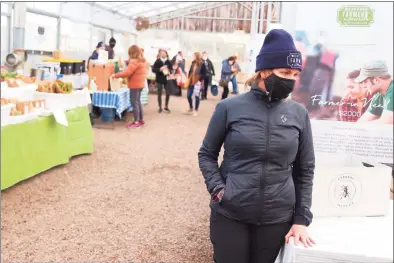  ?? Jarret Liotta / Hearst Connecticu­t Media ?? Lori Cochran-Dougall, the Westport Farmers’ Market executive director, stands in the market on Thursday in Westport.