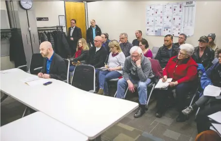  ?? LIAM RICHARDS ?? Jeff Jackson, seated at the table, told a municipal planning commission regarding Airbnb and other rental agreements during a meeting at City Hall on Tuesday that “Quite frankly, public consultati­on on this file was done in bad faith.”