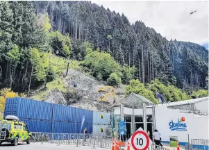  ?? PHOTO: MATTHEW MCKEW ?? Concern for paraglider . . . St John staff and police are on standby at the foot of the Skyline Gondola, Queenstown, as a helicopter searches for a ‘‘missing’’ person. It turned out to be a false alarm.