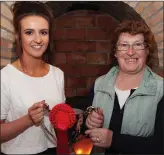  ??  ?? Jamie O’Neill presents the trophy for ‘Best Pen of Genuine Mountain Cheviot Ewes (two years old)’ to Breda Devitt.