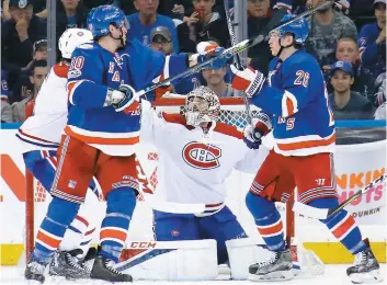  ??  ?? Carey Price a stoppé 20 des 21 tirs des Rangers, en route vers sa sixième victoire d’affilée au Madison Square Garden.