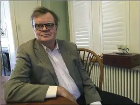  ?? AP PHOTO/JEFF BAENEN ?? In this Friday photo, Garrison Keillor poses for a photo in Minneapoli­s. Keillor discusses allegation­s of sexual harassment in his first extended interview since Minnesota Public Radio severed ties with the former “A Prairie Home Companion” creator and...