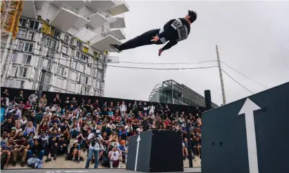  ??  ?? Mexico’s Daniel Suárez Vanegas performs during this year’s Parkour World Cup event in Montpellie­r, which was organised by the FIG. Many believe such competitio­ns go against the spirit of parkour. Photograph: Lucas Barioulet/AFP/Getty Images