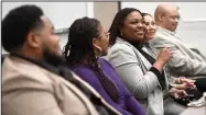  ?? (NWA Democrat-Gazette/Andy Shupe) ?? Josilyn Mitchell (center) of the Arkansas Department of Transporta­tion speaks Thursday alongside fellow panel members Dexter Payne (from left) of The Coca-Cola Co., Nicole McGinister of Rheem Manufactur­ing, Sonia Spinks of Walmart and Adrian Cummings of J.B. Hunt Transport Services during a Black History Month panel discussion organized by the National Society of Black Engineers in the Bell Engineerin­g Center on the University of Arkansas campus in Fayettevil­le. Visit nwaonline.com/photo for today’s photo gallery.