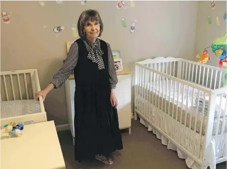  ??  ?? Retired nurse Angela Hatch — in her View Royal townhouse — is one of the Ministry of Children and Family Developmen­t’s go-to foster parents for some of the most vulnerable infants, many of them born with addictions or medically fragile.