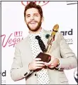  ?? (AFP) ?? Thomas Rhett, winner of the TopCountry Song Award.