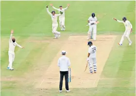  ??  ?? Main man: India’s Rishabh Pant hits past Joe Root’s dive (right); Moeen Ali (above) celebrates the dismissal of Ajinkya Rahane who was caught by wicketkeep­er Jos Buttler