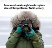  ??  ?? Aurora used a wide-angle lens to capture slices of the spectacula­r Arctic scenery.