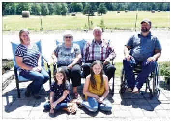  ?? STACI VANDAGRIFF/RIVER VALLEY & OZARK EDITION ?? The Jerry Duvall family of Hattievill­e is the 2019 Conway County Farm Family of the Year; they have also been named the Western District Farm Family of the Year. Family members include, front row, from left, Payton Duvall, 8, and Brooke Duvall, 12; and back row, Jayme Duvall, Kathy Duvall, Jerry Duvall and Jeremy Duvall. The Duvalls raise hay, timber, corn and soybeans, as well as cattle and poultry.