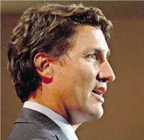  ?? JASON FRANSON/The Canadian Press files ?? Liberal leader Justin Trudeau didn’t fare much better than Harper in his terrible analogy of
Harper’s policy on the niqab ban, writes Andrew Coyne.