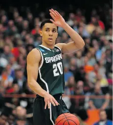  ??  ?? ELSA/GETTY IMAGES Travis Trice provides the Michigan State Spartans with plenty of scoring punch at guard in the NCAA Final Four this weekend.