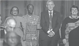  ?? REGISTER FILE PHOTO ?? World Food Prize Laureates Maria Andrade, left, Robert Mwanga, Howarth Bouis and Jan Low receive applause at the 2016 ceremony at the Capitol building in Des Moines on Oct. 13, 2016. They were honored for a hunger-fighting sweetpotat­o.