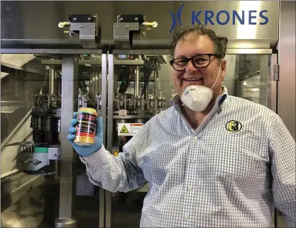  ?? PHOTO BY SAL PIZARRO ?? Gordon Biersch co-founder Dan Gordon holds a can of Don Gordo Mexican-style lager at Gordon Biersch brewery in San Jose last month.