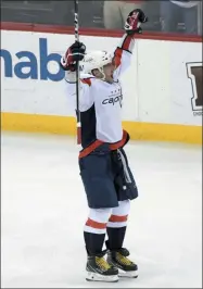  ?? BILL KOSTROUN - THE ASSOCIATED PRESS ?? Washington Capitals left wing Alex Ovechkin (8) celebrates his 700th career goal during the third period of an NHL hockey game against the New Jersey Devils Saturday, Feb. 22, 2020, in Newark, N.J.