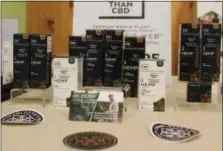  ??  ?? A line of Charlotte’s Web hemp products is displayed during a Kimberton Whole Foods workshop. The line includes oils, capsules, creams and balms. All Charlotte’s Web products are gluten-free, vegan, and non-GMO according to the company website.