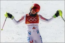  ?? MORRY GASH — THE ASSOCIATED PRESS ?? Mikaela Shiffrin reacts to her time during the second run of the women’s slalom on Friday.