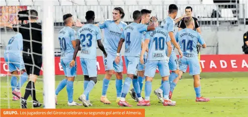  ?? EFE /CARLOS BARBA ?? GRUPO.
Los jugadores del Girona celebran su segundo gol ante el Almería.