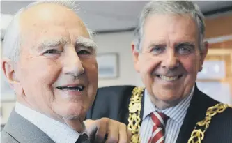  ??  ?? Second World War veteran Wallace Hepburn pictured as he received his Veterans’ Badge.