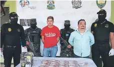  ??  ?? DETENIDOS. Walter Alejandro Mejía y Edwin Romero.