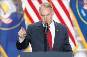  ?? GEORGE FREY/GETTY ?? Interior Secretary Ryan Zinke wants to move the headquarte­rs of three large public lands agencies to the West.