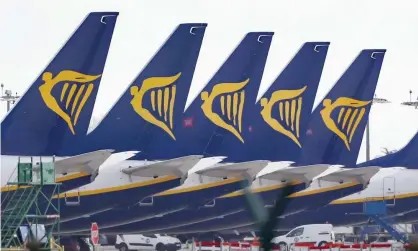  ?? Photograph: Niall Carson/PA ?? Ryanair jets parked on the runway of Dublin airport.